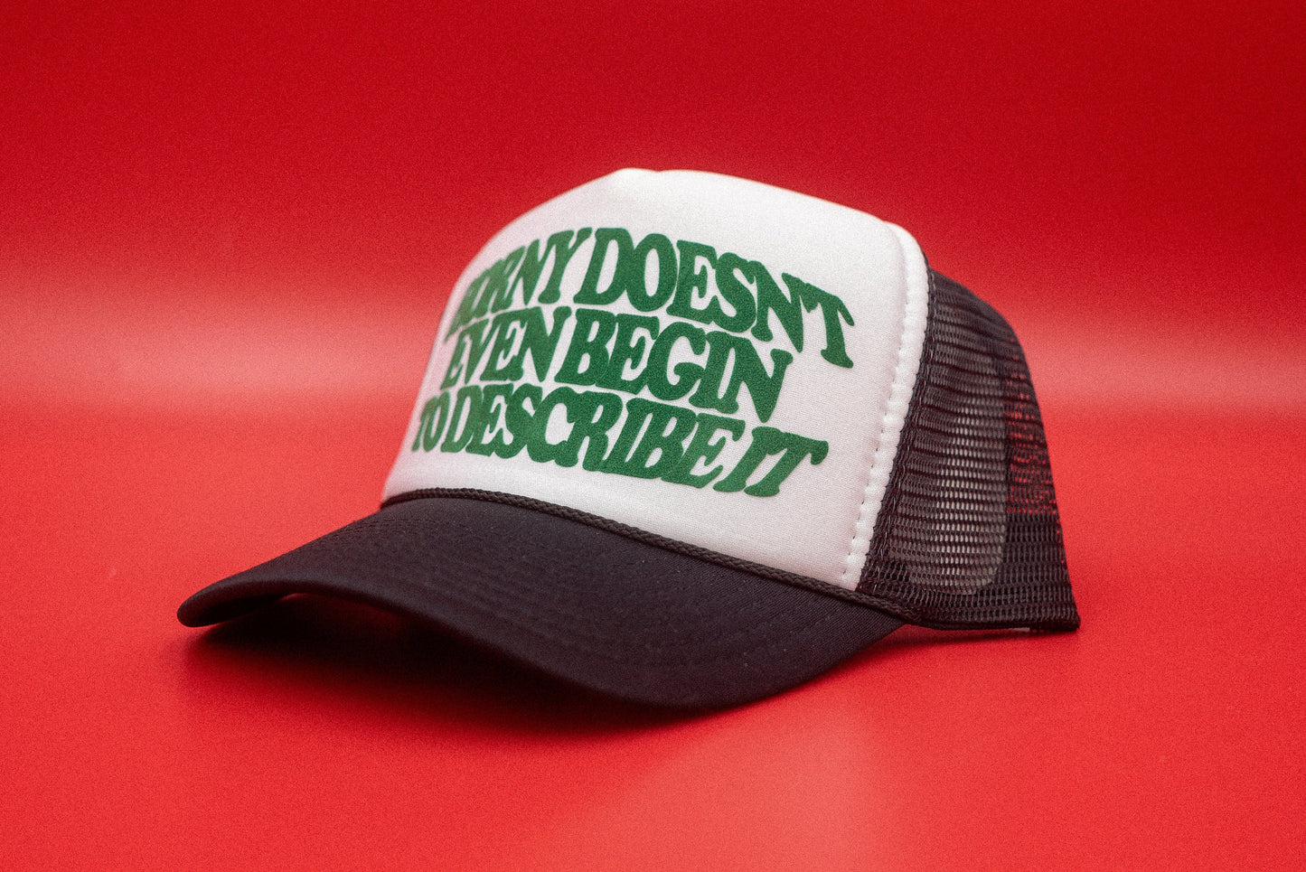 The "Horny Doesn't Even Begin To Describe It" Funny Trucker Hat